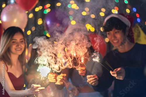 Happy Asian friends celebra...