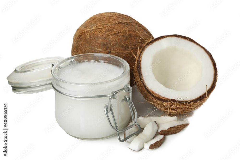 Coconut and jar of coconut milk isolated on white background Coconut and jar of coconut milk isolated on white background