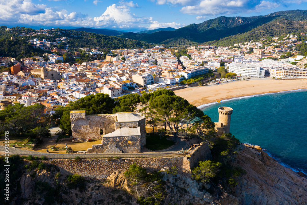 Scenic view from drone of Spanish town of Tossa de Mar, famous tourist destination in Spain