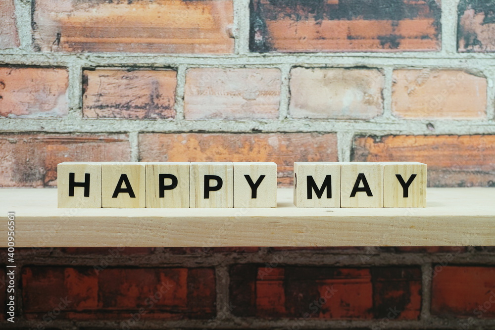 Happy May alphabet letter on shelves wooden background Happy May alphabet letter on shelves wooden background