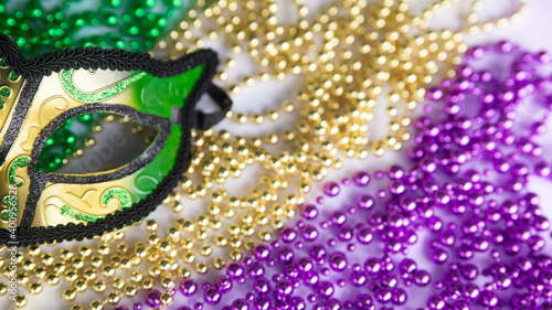 Mardi gras beads and mask, carnival concept