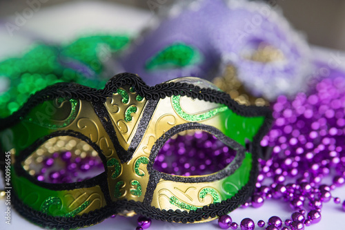 Mardi gras beads and masks close up