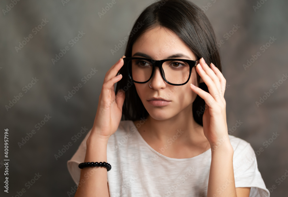 Portrait of woman wearing glasses. Selective focus.