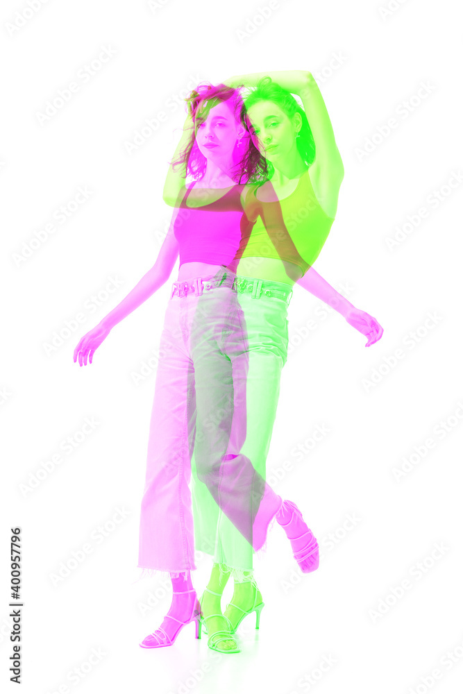 Steps. Multiple portrait with glitch duotone effect. Multiple exposure, abstract fashionable beauty photo. Young beautiful female model posing. Youth culture, composite image, fashionable people. Steps. Multiple portrait with glitch duotone effect. Multiple exposure, abstract fashionable beauty photo. Young beautiful female model posing. Youth culture, composite image, fashionable people.