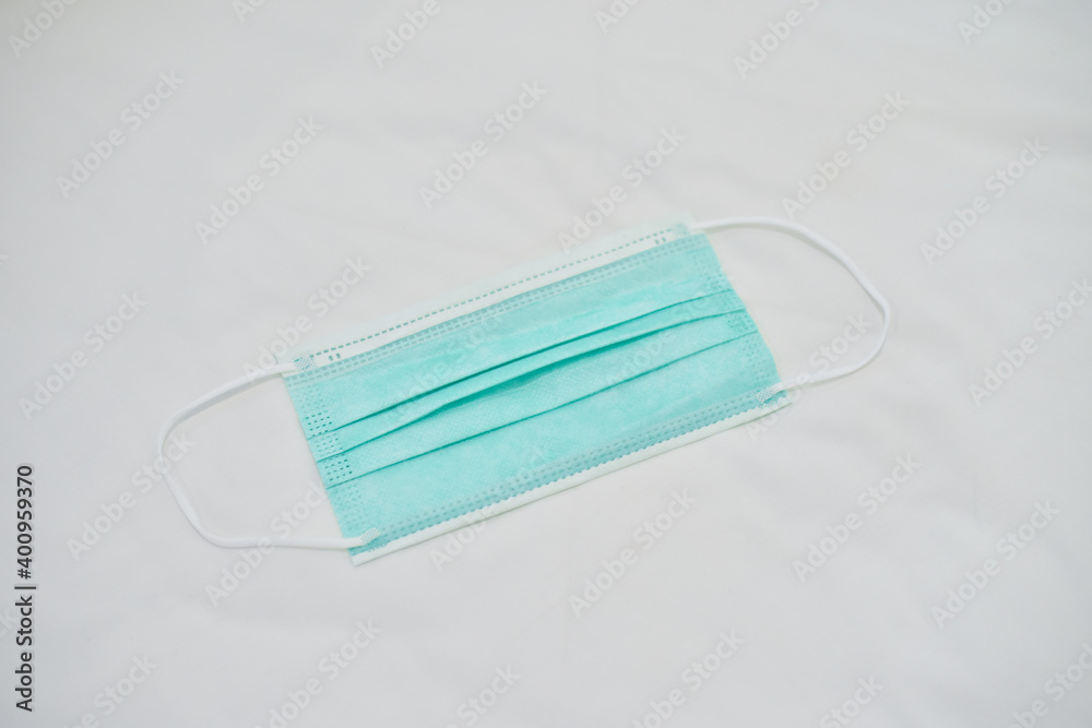 Green surgical mask on white background. Green surgical mask on white background.