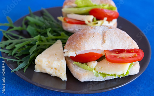 Sandwiches with hard cheese and vegetables