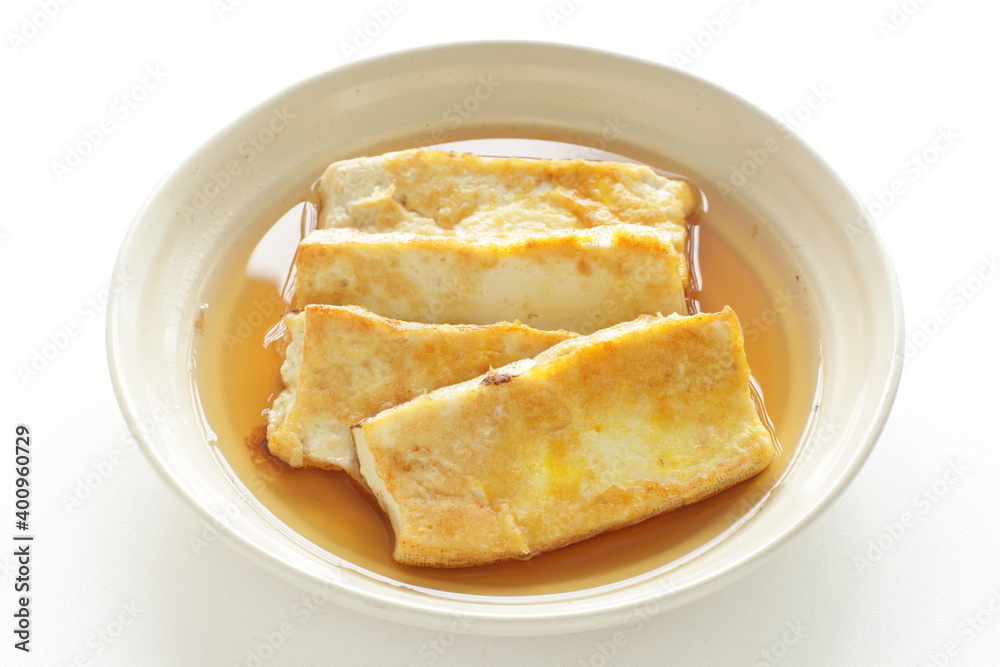 Japanese food, pan fried tofu and soy sauce with copy space