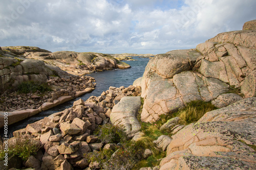 Hiking path, trail called friluftsked  Kleven,  south of Smögenbryggan, walking thourgs huge brown rocks, with view on the sea, Sweden, Europe photo