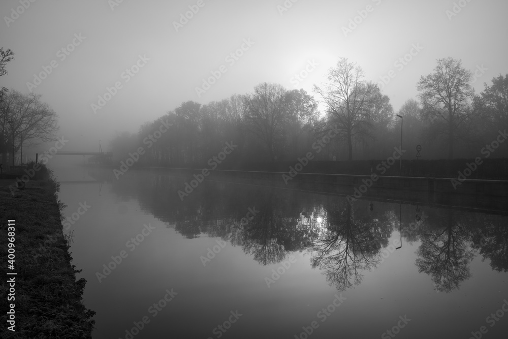 Fototapeta premium gloomy river in the fog. High quality photo