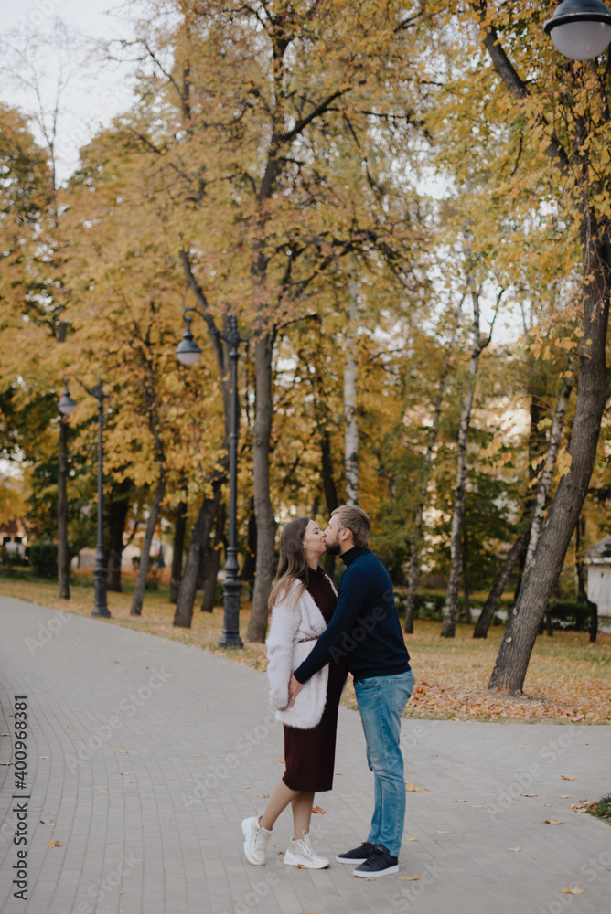 Young adult couple in love in autumn Park Young adult couple in love in autumn Park