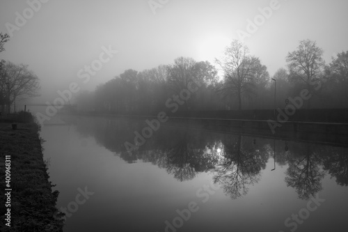  gloomy river in the fog. High quality photo