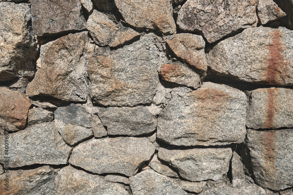 Fototapeta premium View of a grey stone wall texture