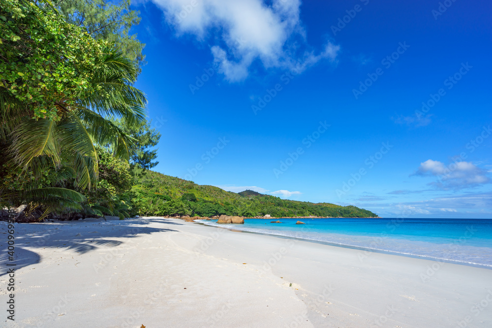 tropical beach at anse lazio, on praslin, seychelles tropical beach at anse lazio, on praslin, seychelles