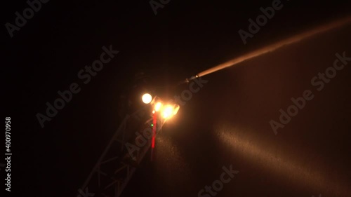 fire truck spraying water on flames photo