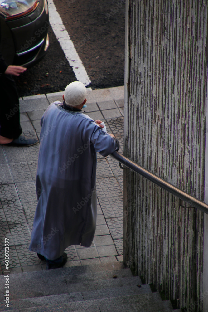 Muslim man waiting in the street Muslim man waiting in the street