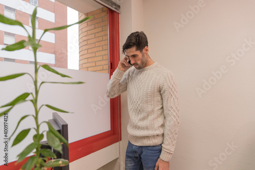 man talking on the phone in an office