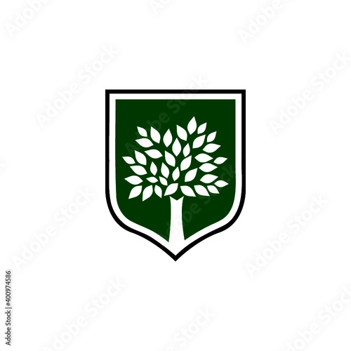 Design template with a tree in a shield as a symbol isolated on white background