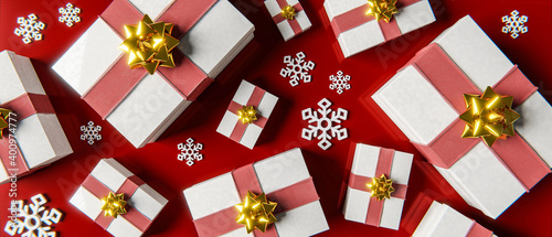 Geschenke mit Schleife und Schneekristallen für Weihnachten: Konzept Dekoration und Feiern photo