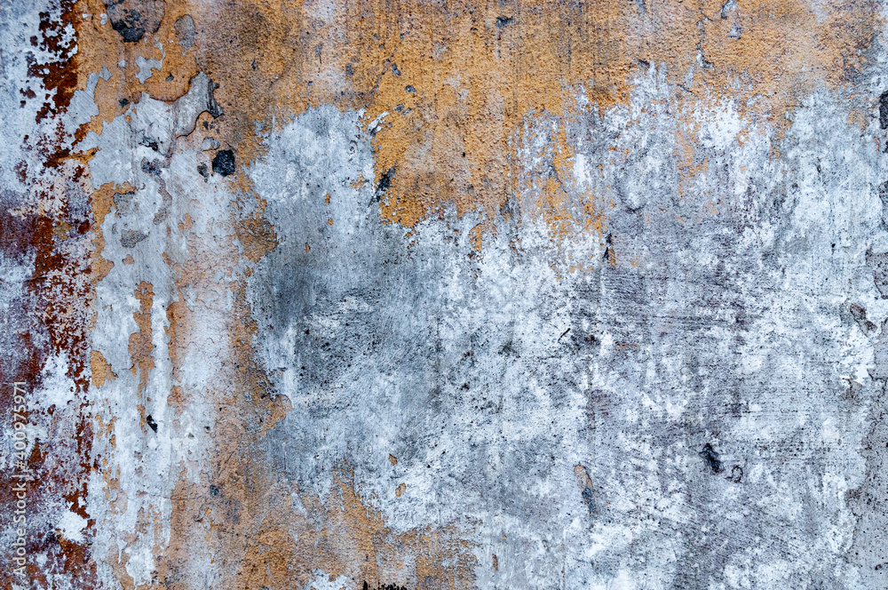 Biege concrete background with cracks and scratches