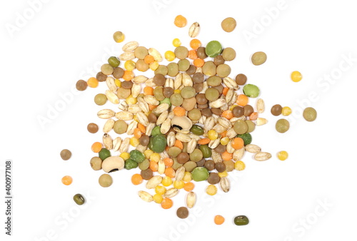 Mixed legumes and cereals, peeled barley, green, yellow and dark red lentils, half green peas, black white beans, green beans isolated on white background, top view