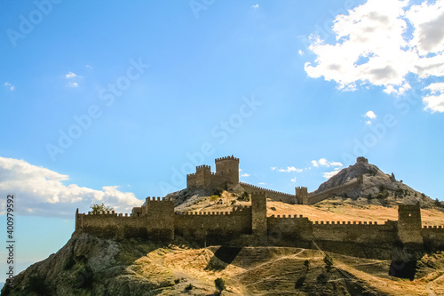 Ancient castle in the Crimea on the rocks by the sea. Medieval building. Fairy knight's castle photo