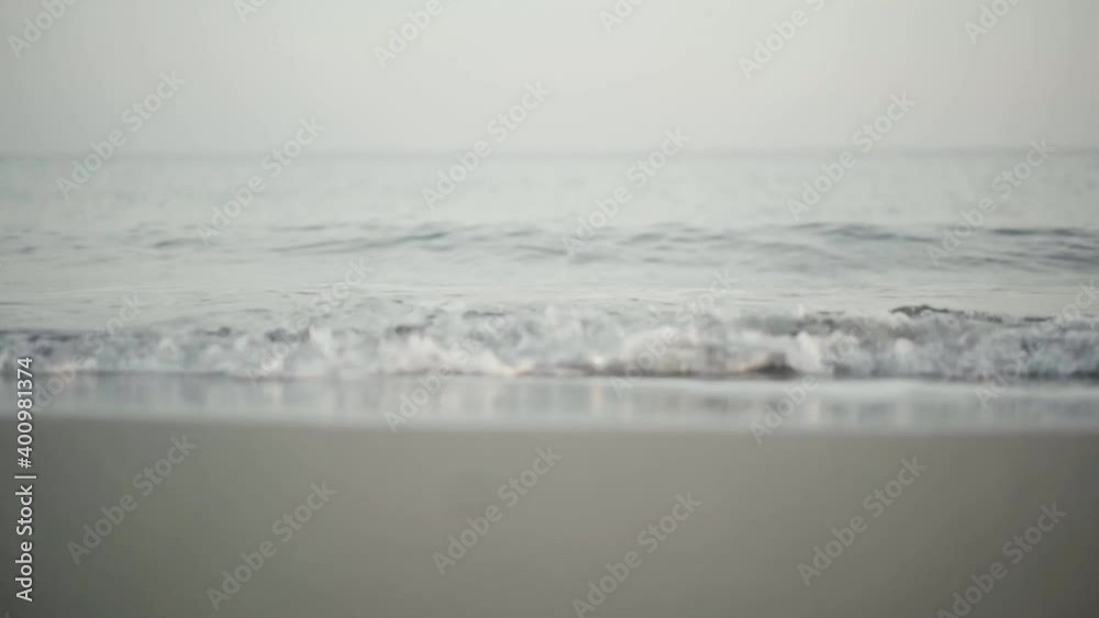 mediterranean sea in Torre del Mar (Andalucía) with gentle waves in autumn while sunset mediterranean sea in Torre del Mar (Andalucía) with gentle waves in autumn while sunset