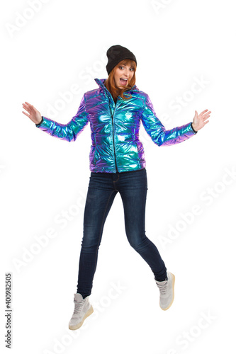 Jumping Happy Young Woman In Winter Clothes