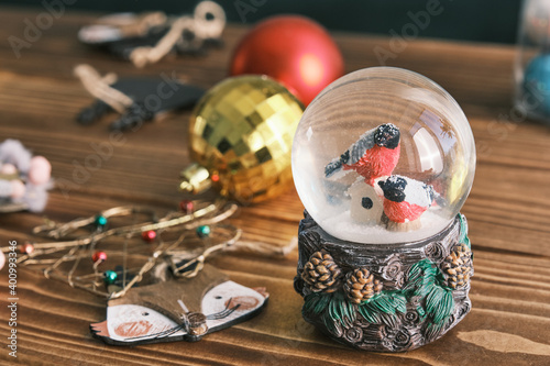 Closeup of a christmas toys and snow globe