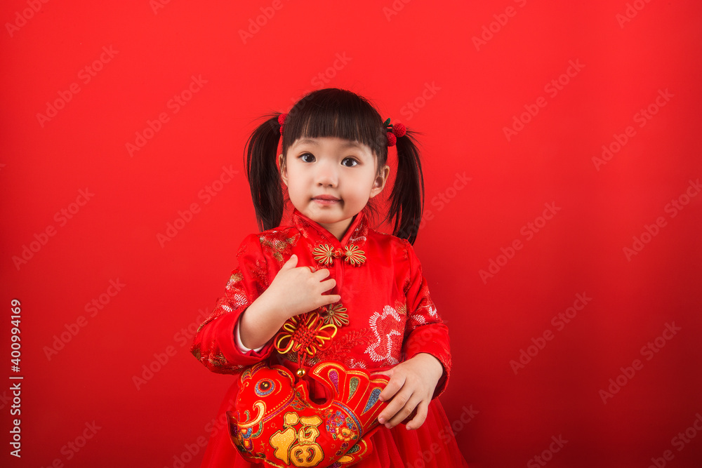 A Chinese girl greeted the Spring Festival with a lantern,Chinese translation:Lucky fortune,wealth A Chinese girl greeted the Spring Festival with a lantern,Chinese translation:Lucky fortune,wealth
