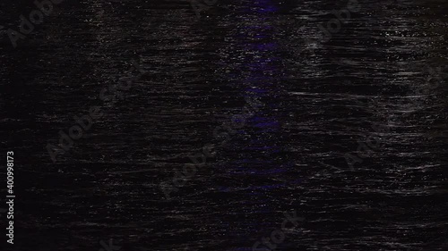 Glitter on the water at night