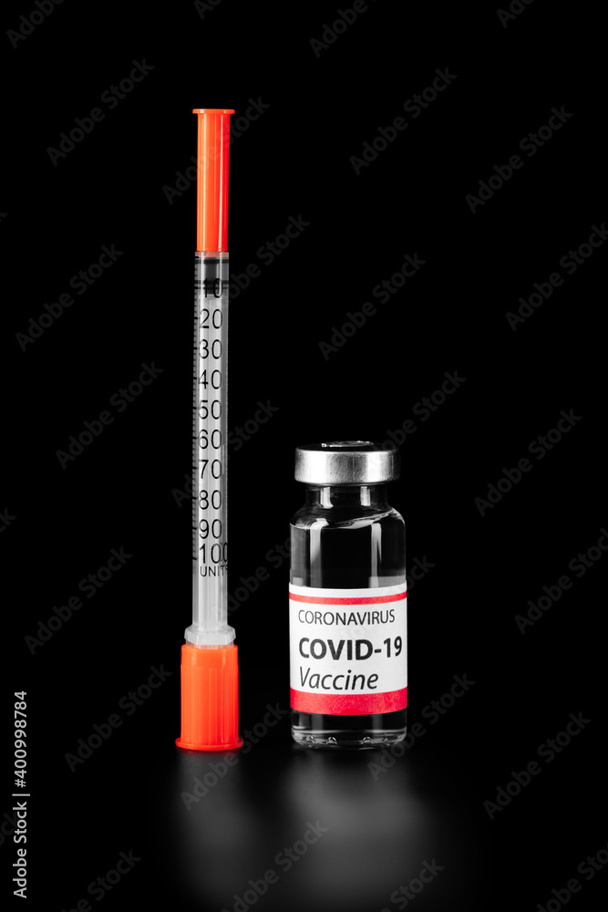 COVID-19 vaccine isolated on black background. Healthcare And Medical concept.
COVID-19 vaccine isolated on black background. Healthcare And Medical concept.