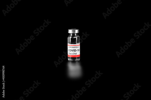 COVID-19 vaccine isolated on black background. Healthcare And Medical concept.