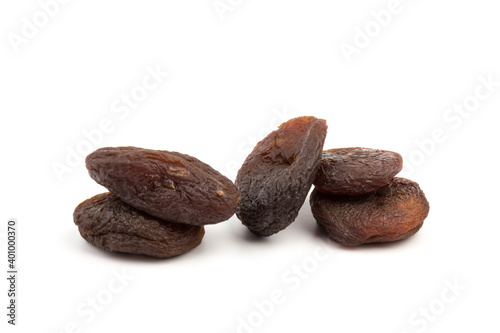 Naturally dried apricots isolated on white background.
