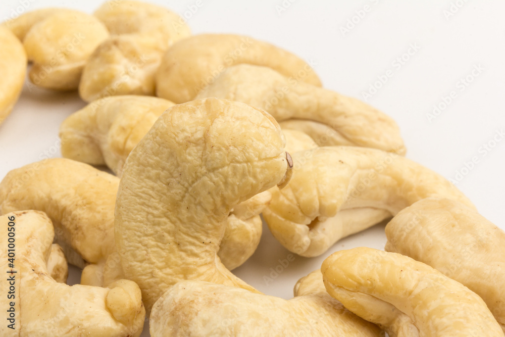 Raw cashew nuts isolated on white background. Raw cashew nuts isolated on white background.