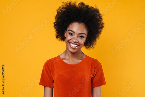 Joyful african american girl smiling and looking at camera © Drobot Dean