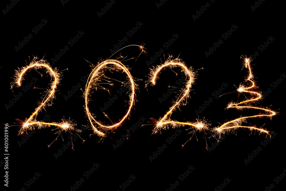 2021 written with Sparkle firework on black background, happy new year 2021 concept