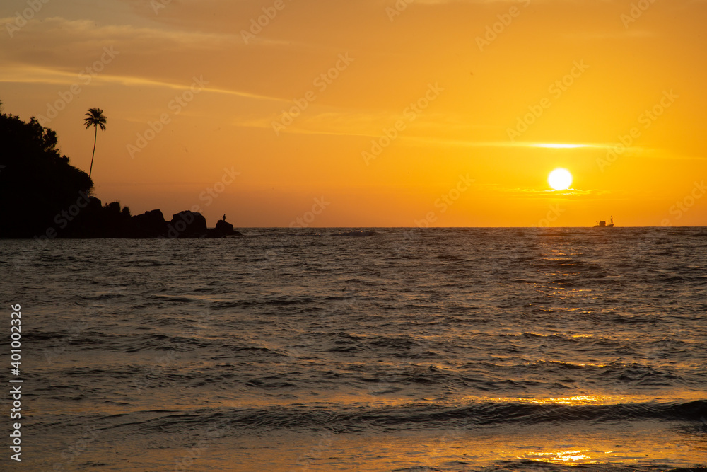 Sunset on the beach, beautiful sunset sky and sea