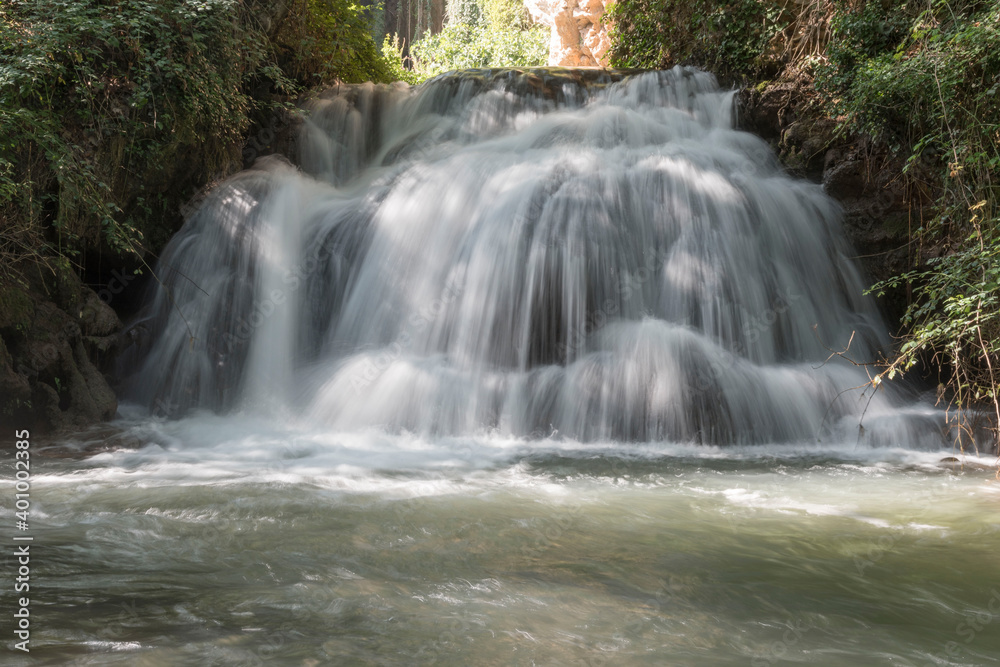 Obraz premium Beautiful shot of the waterfalls in the historical garden park of the Stone Monastery in Nuevalos