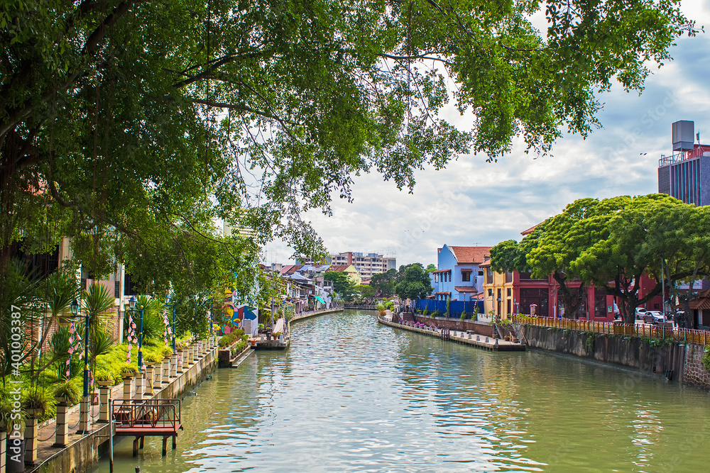 Riverside scenery of a cruise crossing by the Melaka River, Malacca, Malaysia