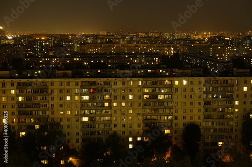 Light in the houses of the sleeping area at night. Moscow, Russia.