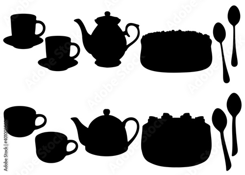 A set for tea drinking with a cake.