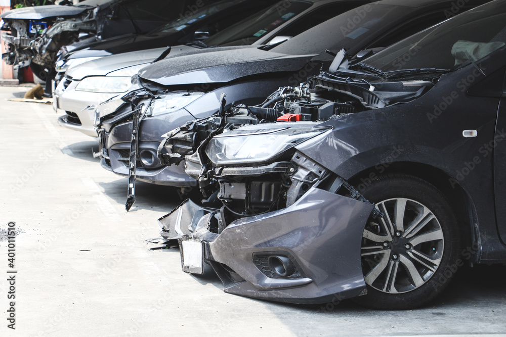 Car wreck in the parking with crash big damaged and broken . Car accident and safety concept. Car wreck in the parking with crash big damaged and broken . Car accident and safety concept.