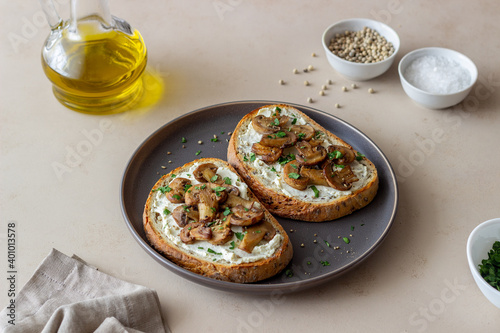 Bruschetta with mushrooms and white cheese. Healthy eating. Vegetarian food.