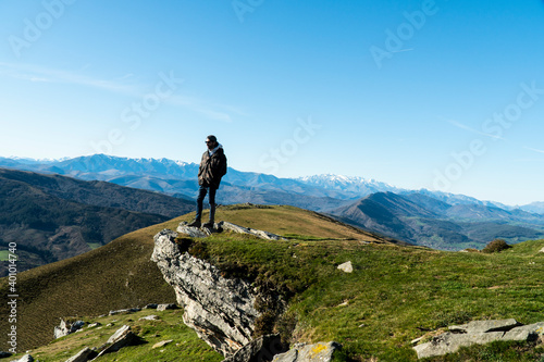 Young man posing after a mountain walk
