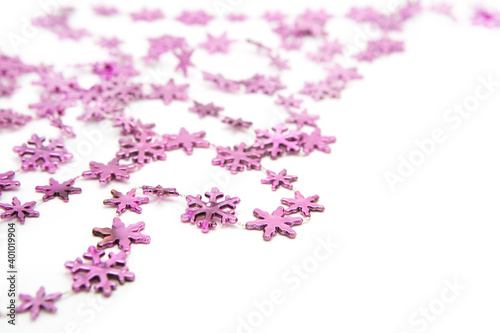 Necklace for festive decoration in the form of snowflakes isolated on white background.