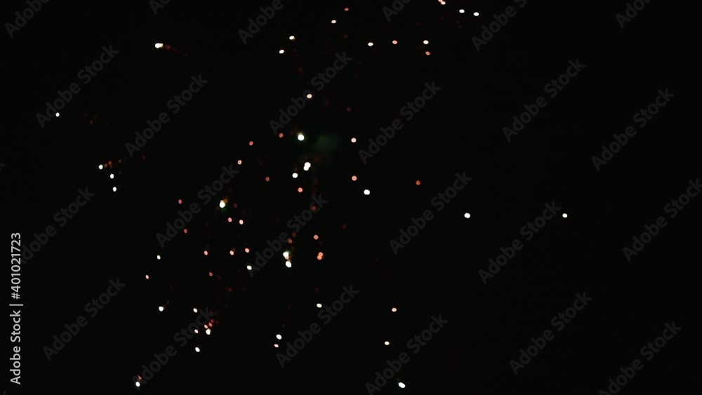 Real Shot of fireworks background. Shining fireworks with bokeh. New year's eve firework celebration.