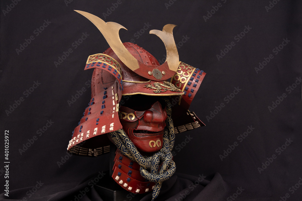 kabuto helmet from a samurai armor. Shown with a black background Stock  Photo | Adobe Stock