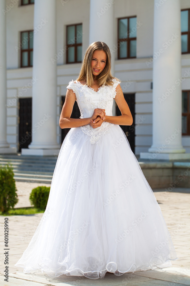 Young beautiful girl in ballroom prom dress Young beautiful girl in ballroom prom dress