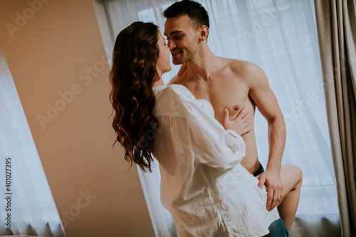 Young couple standing by th...