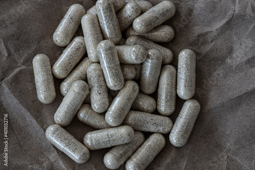 close-up of super enzymes capsules. dietary concept. dietary supplement topview. photo